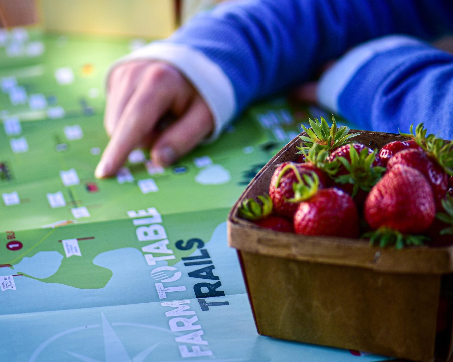 a box of farm fresh strawberries