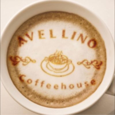 Coffee mug with Avellino Coffeehouse in the latte foam