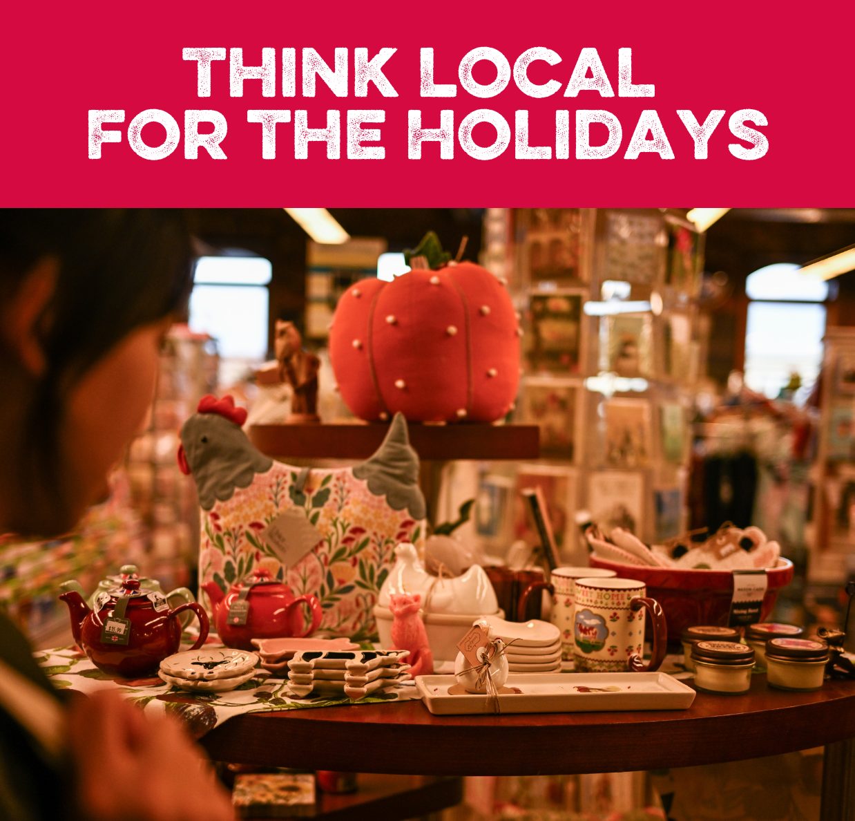 TLF Holidays_Square Image Block Products on a table at Paper Dreams with a shopper in the background and text that reads Think Local for the Holidays