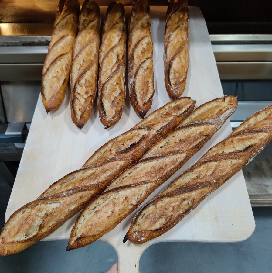 a tray of baguettes